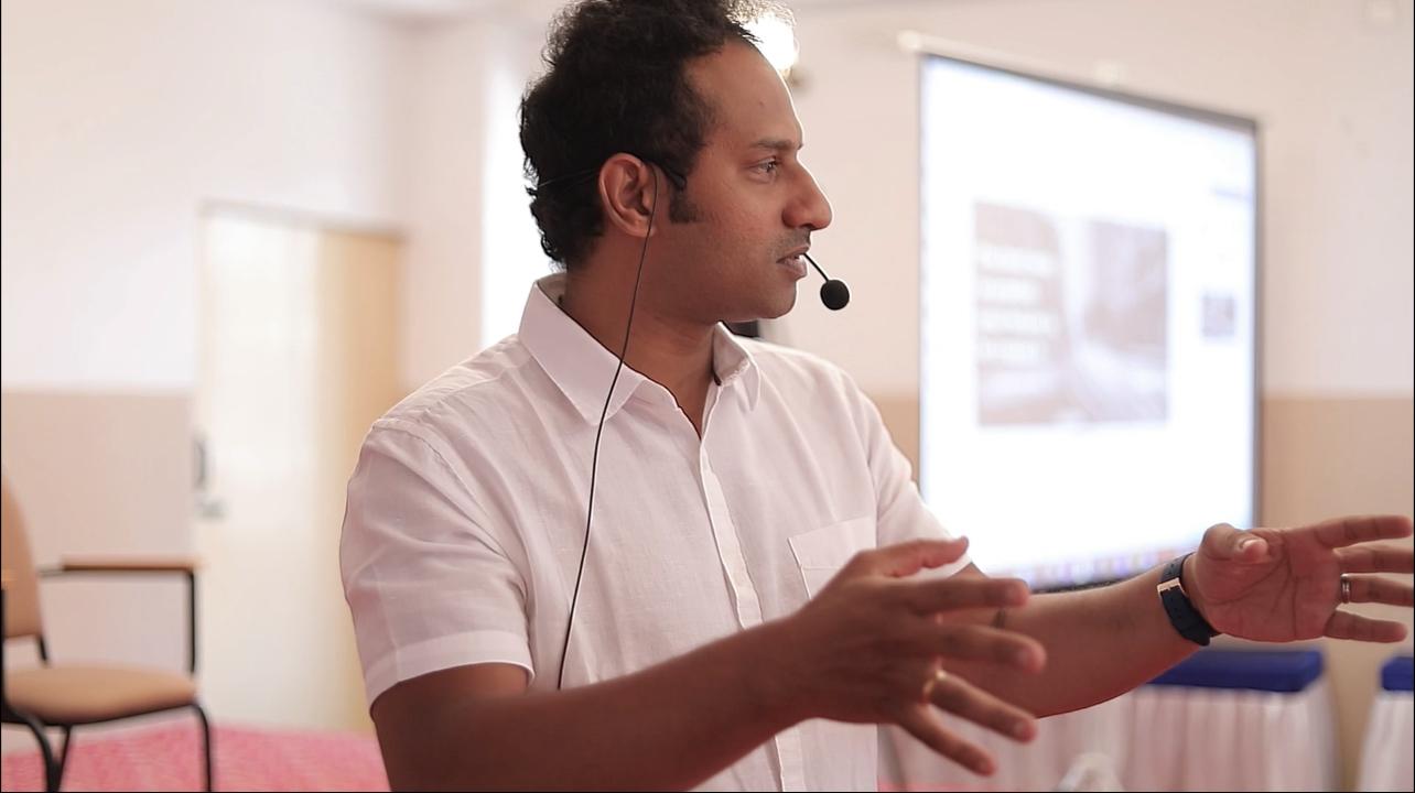 Mohit Kamat moderating a panel